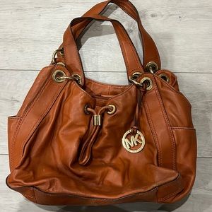 Michael kors purse. Burnt orange. Leather.